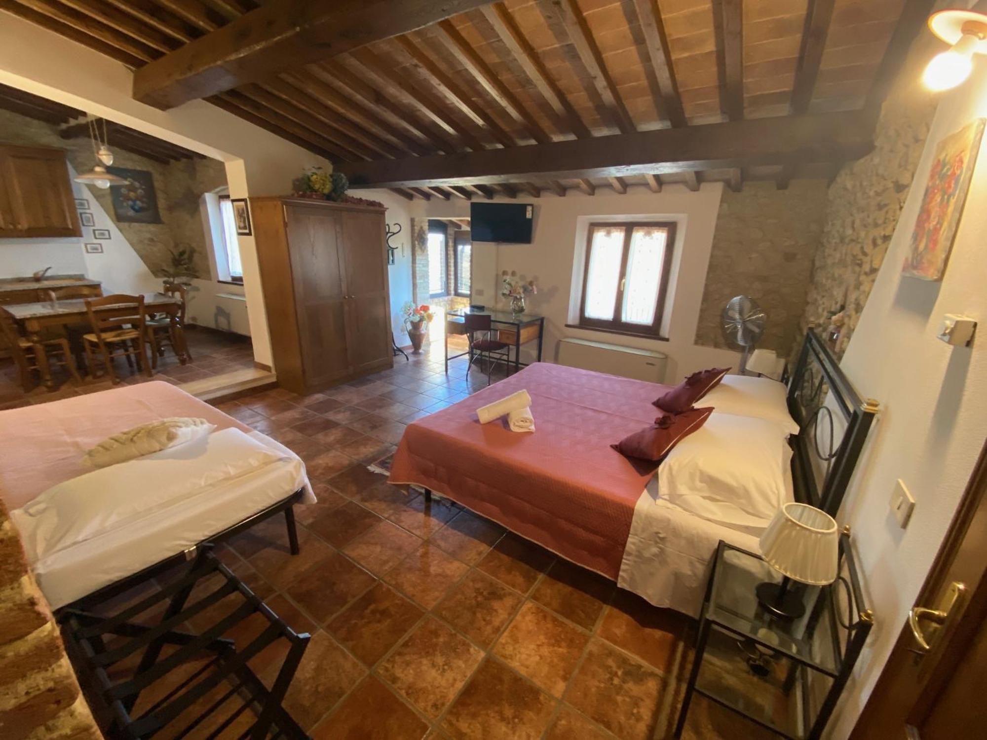 Casa Vacanze Etrusco Сан-Джиміньяно Номер фото